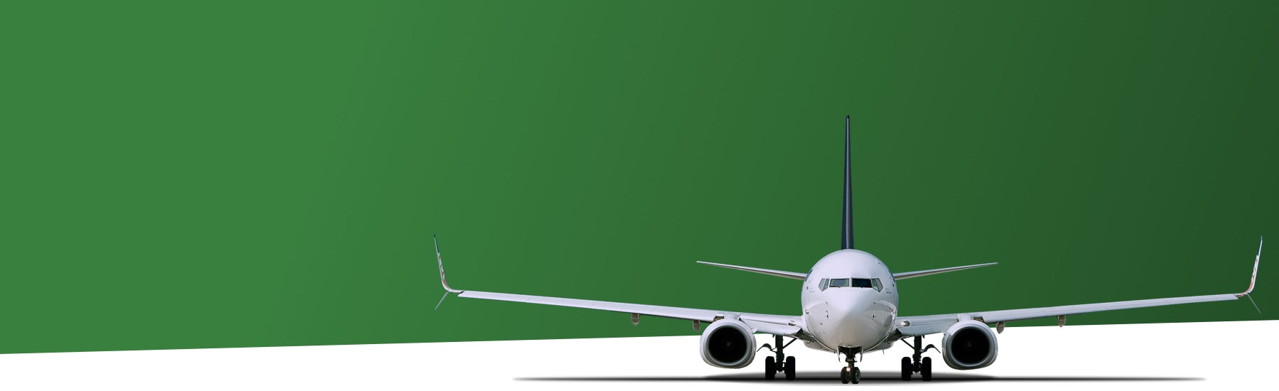 An aeroplane with a green and white background.