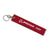 A red keychain with the words Boeing 737 printed on front.