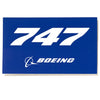 A blue sticker with 747 and Boeing printed on it.